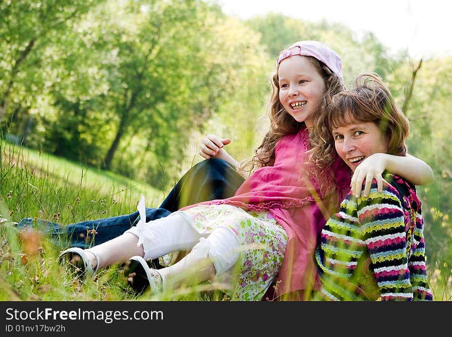 Mother and daughter have a happy time together. Mother and daughter have a happy time together