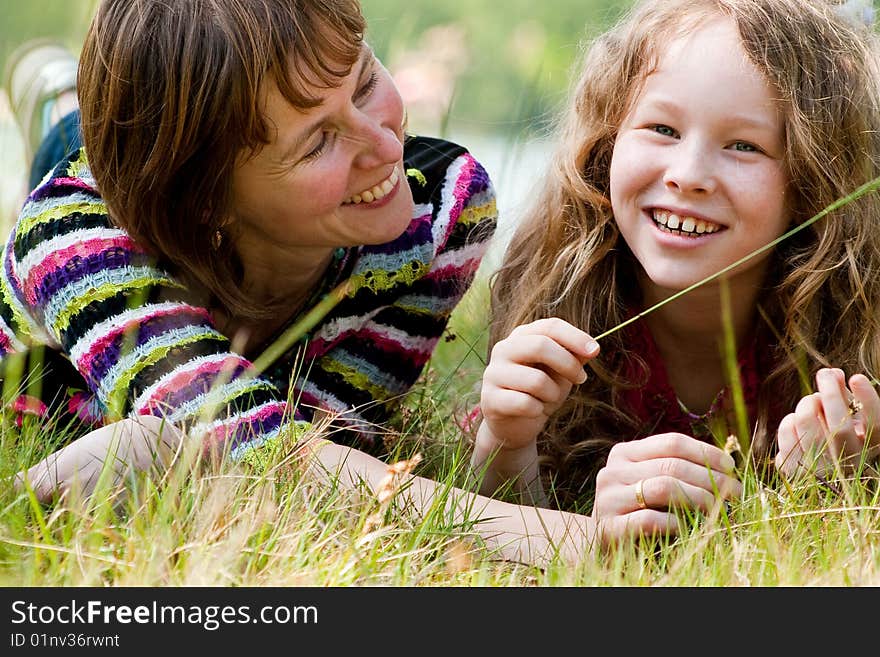 Mother and daughter have a happy time together. Mother and daughter have a happy time together