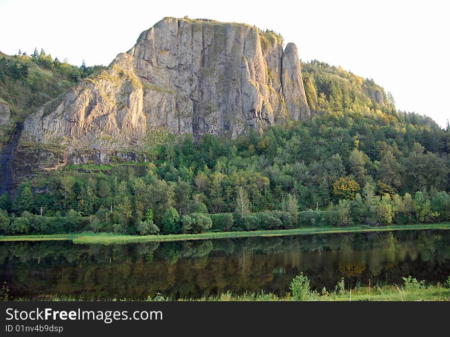 Landscape with reflection of tableau in waters edge, Oregon. Landscape with reflection of tableau in waters edge, Oregon