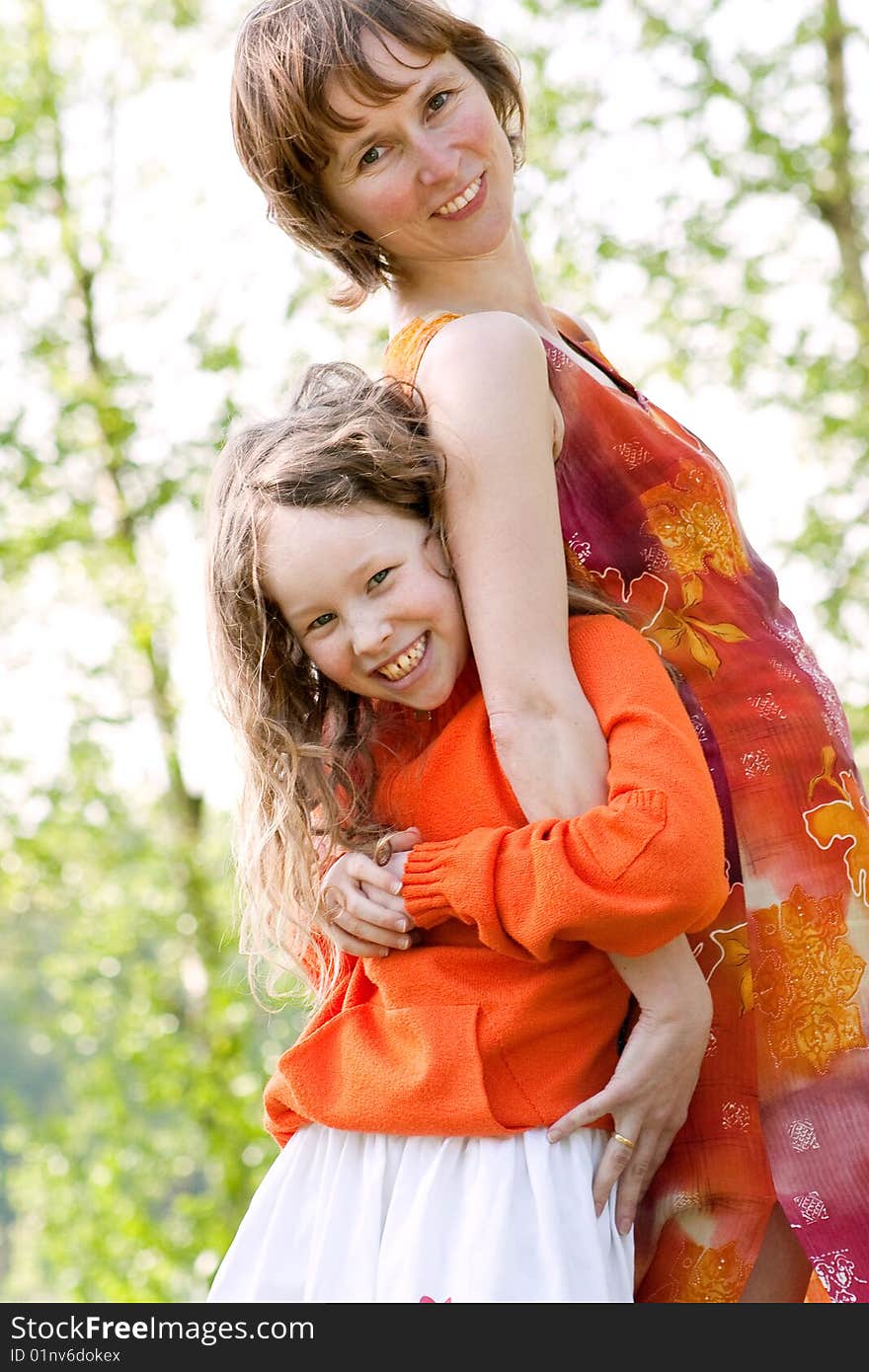 Mother and daughter have a happy time together. Mother and daughter have a happy time together