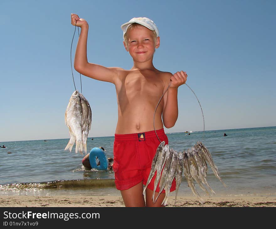 The boy sells  fish