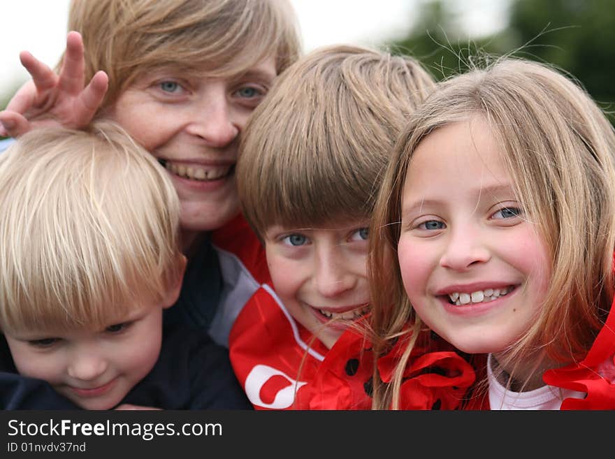 Children are happy with their mom. Children are happy with their mom