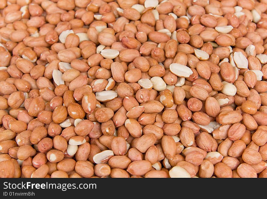 Close up on some peanuts out of the shell.