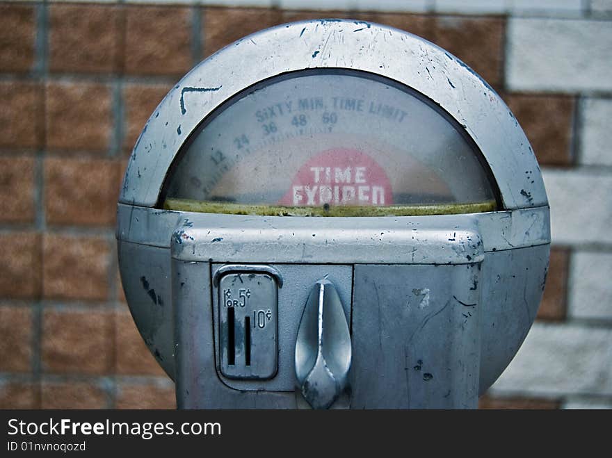 Retro parking meter with expired sign. Retro parking meter with expired sign.