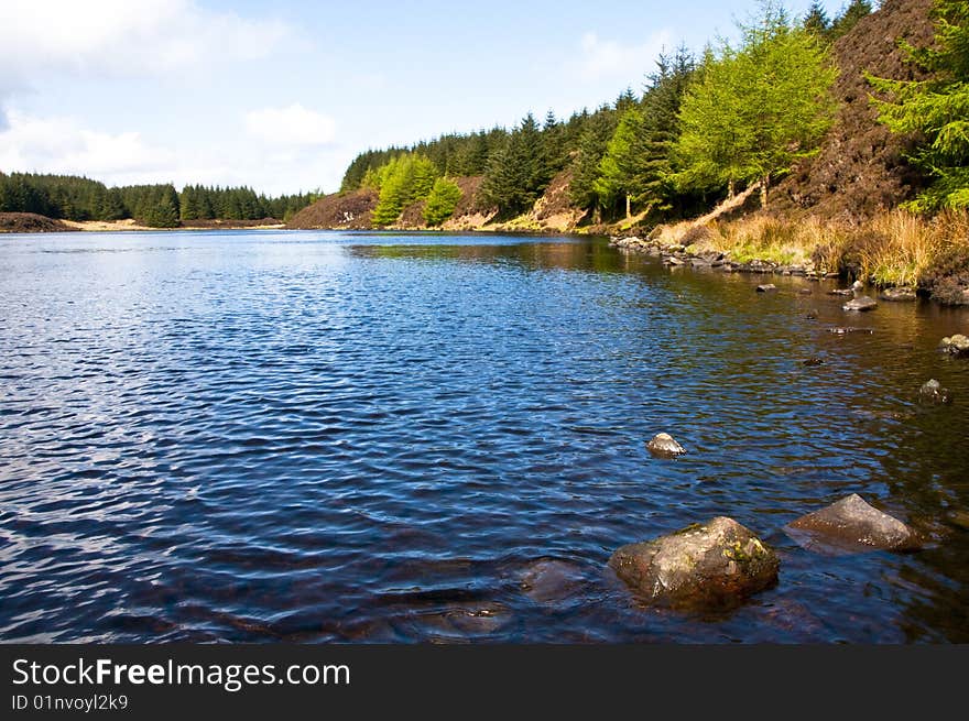 Fishing Loch Isle or Arran in remote place. Fishing Loch Isle or Arran in remote place