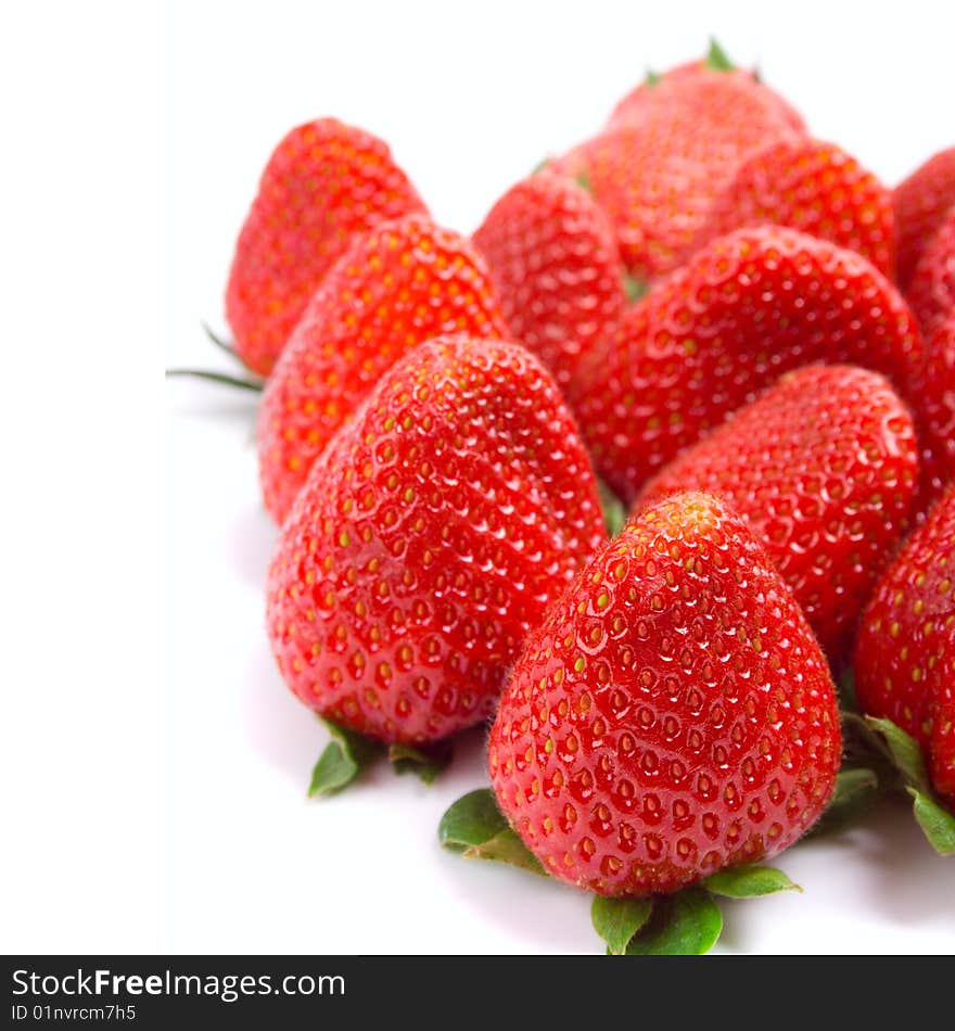 Fresh strawberries closeup on white background