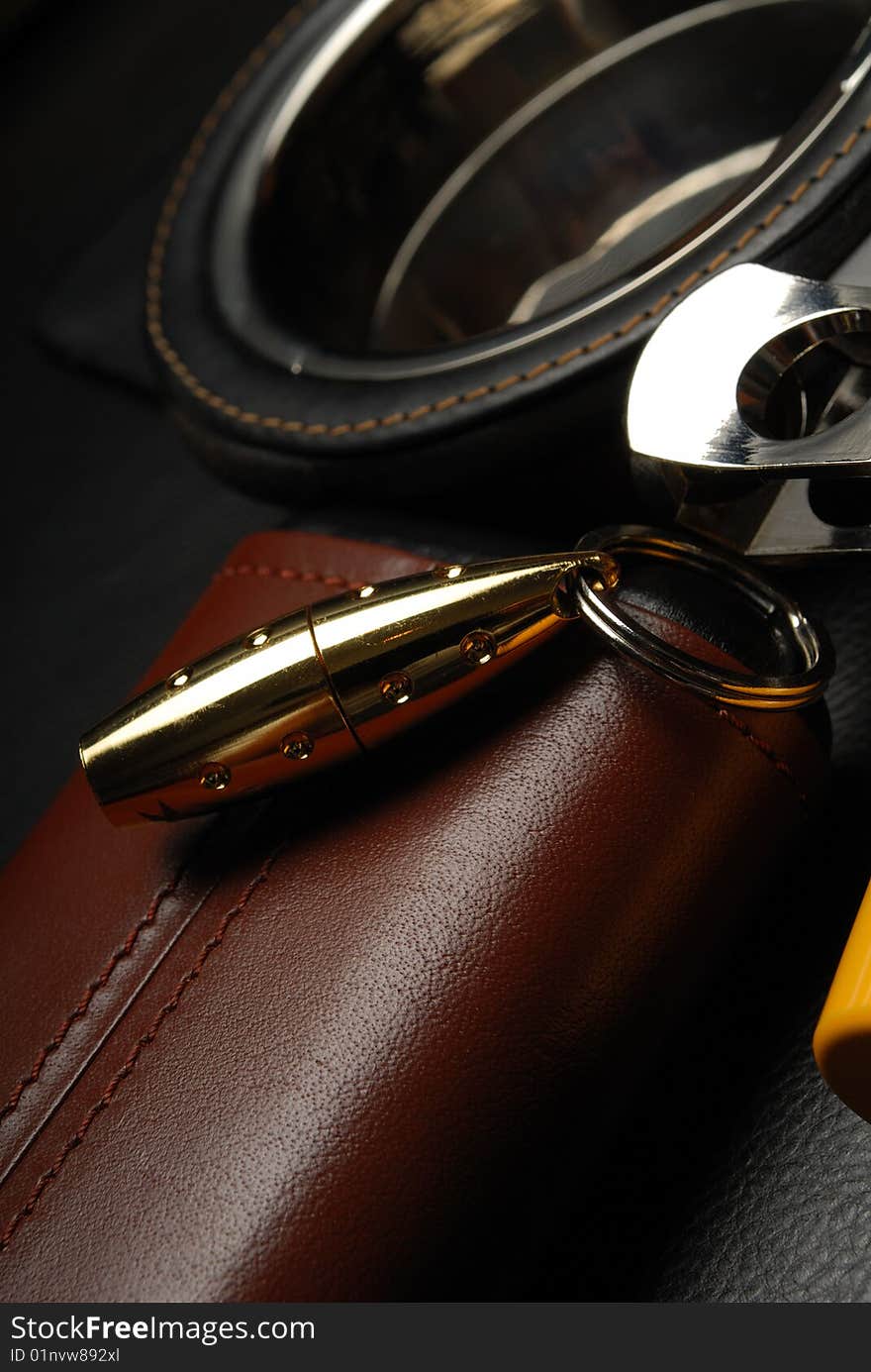 Cigarette case, charm and ashtray from a genuine leather