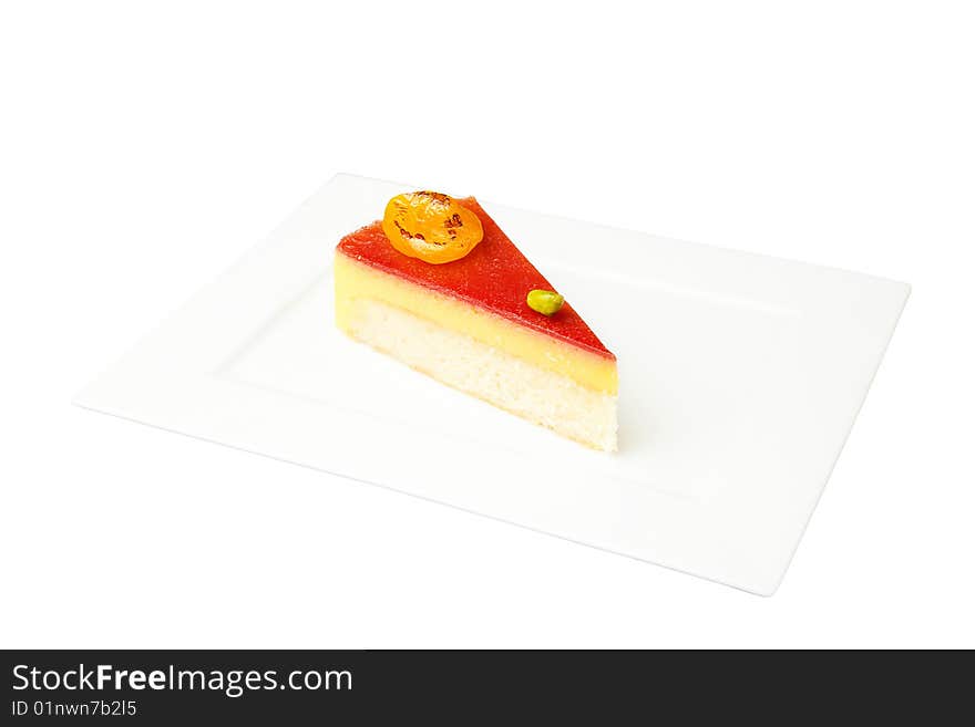 Cheesecake with nut on white plate