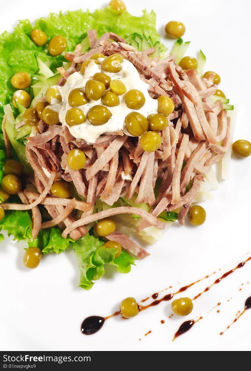 Green Peas and Meat Salad Served with Salad Leaves and Sauce