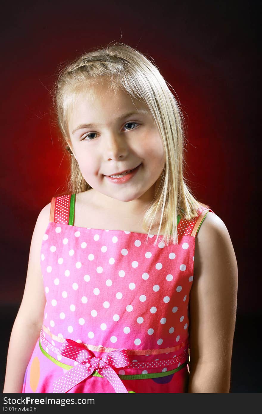 A childs portrait on a black background. A childs portrait on a black background