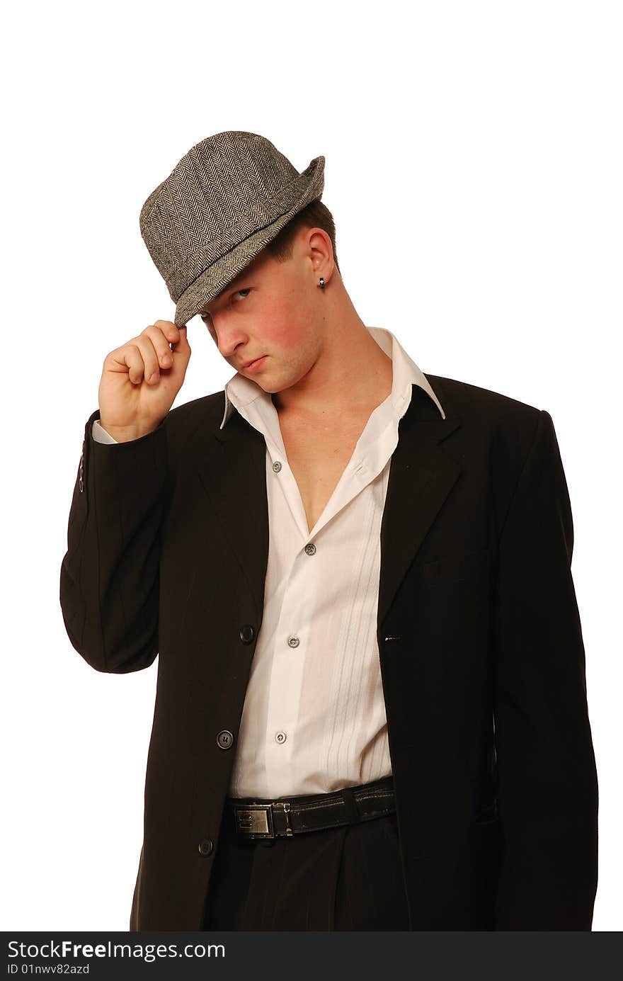 The young man in a suit and a soft felt hat.