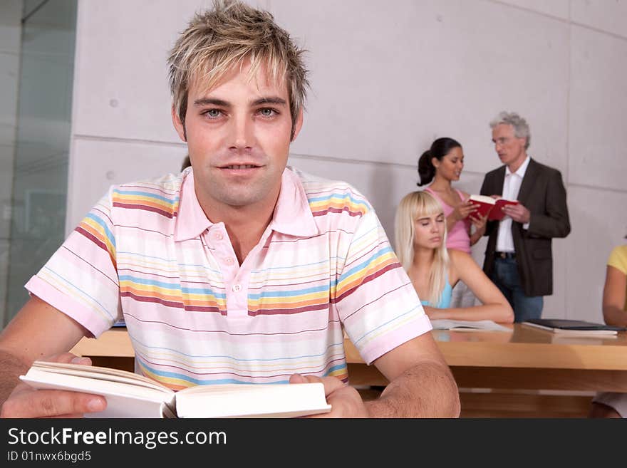 Portrait of male student looking at camera.