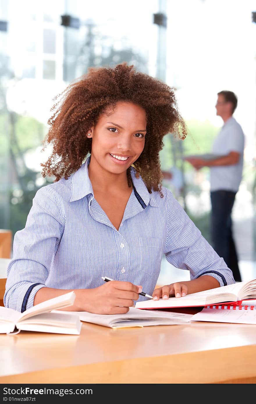 Portrait of female student looking at camera.