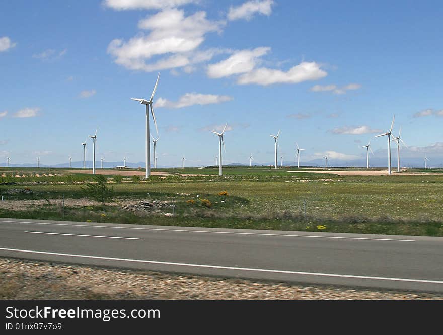 Wind turbines against the sky in fields of Spain. Wind turbines against the sky in fields of Spain