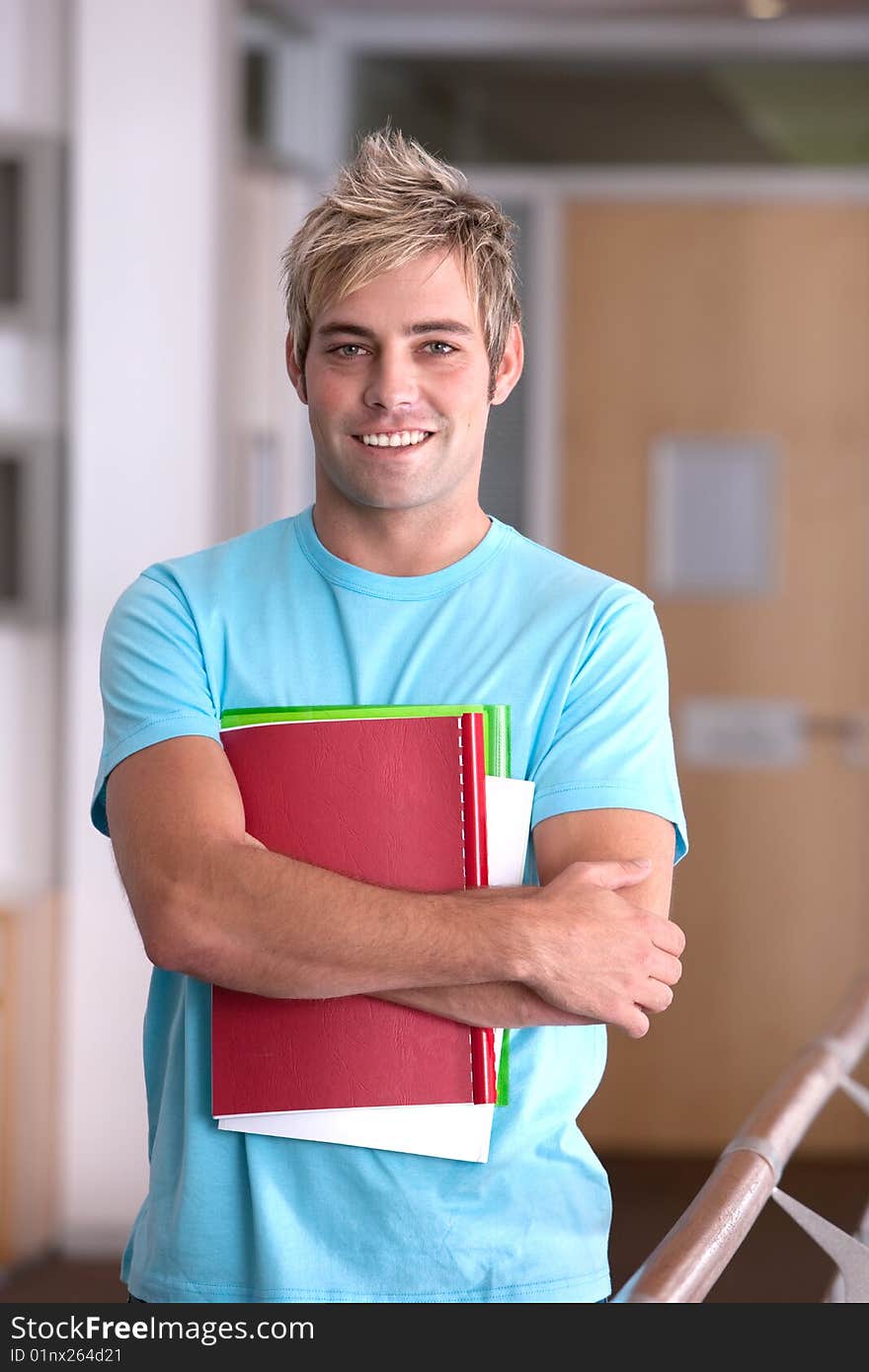 Portrait of male student looking at camera. Portrait of male student looking at camera.