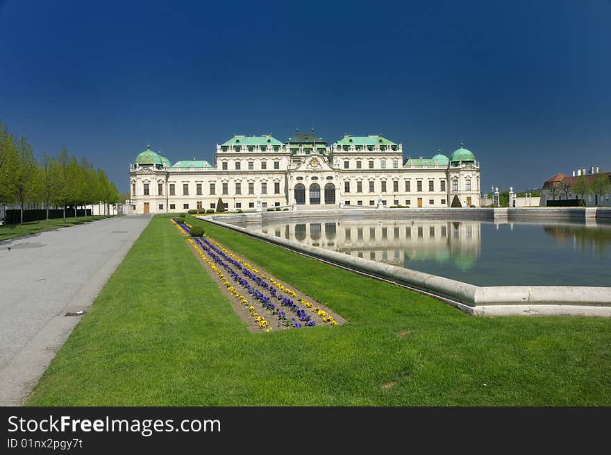 Front view on the summer royal residence of Gabsburg's - Belveder palace with fountain on foreground