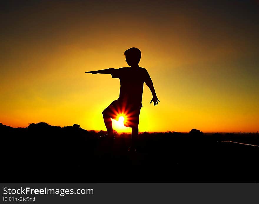 Silhouette of my son at sunset