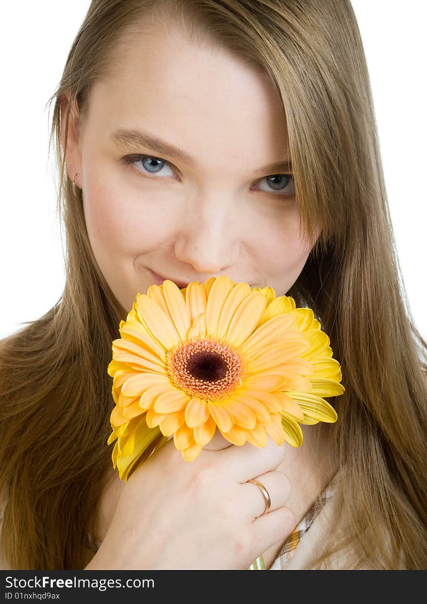 Smiling girl with yellow flowers on white background. Smiling girl with yellow flowers on white background