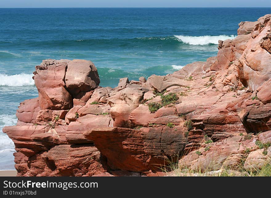 Red rocks on the coast. Red rocks on the coast