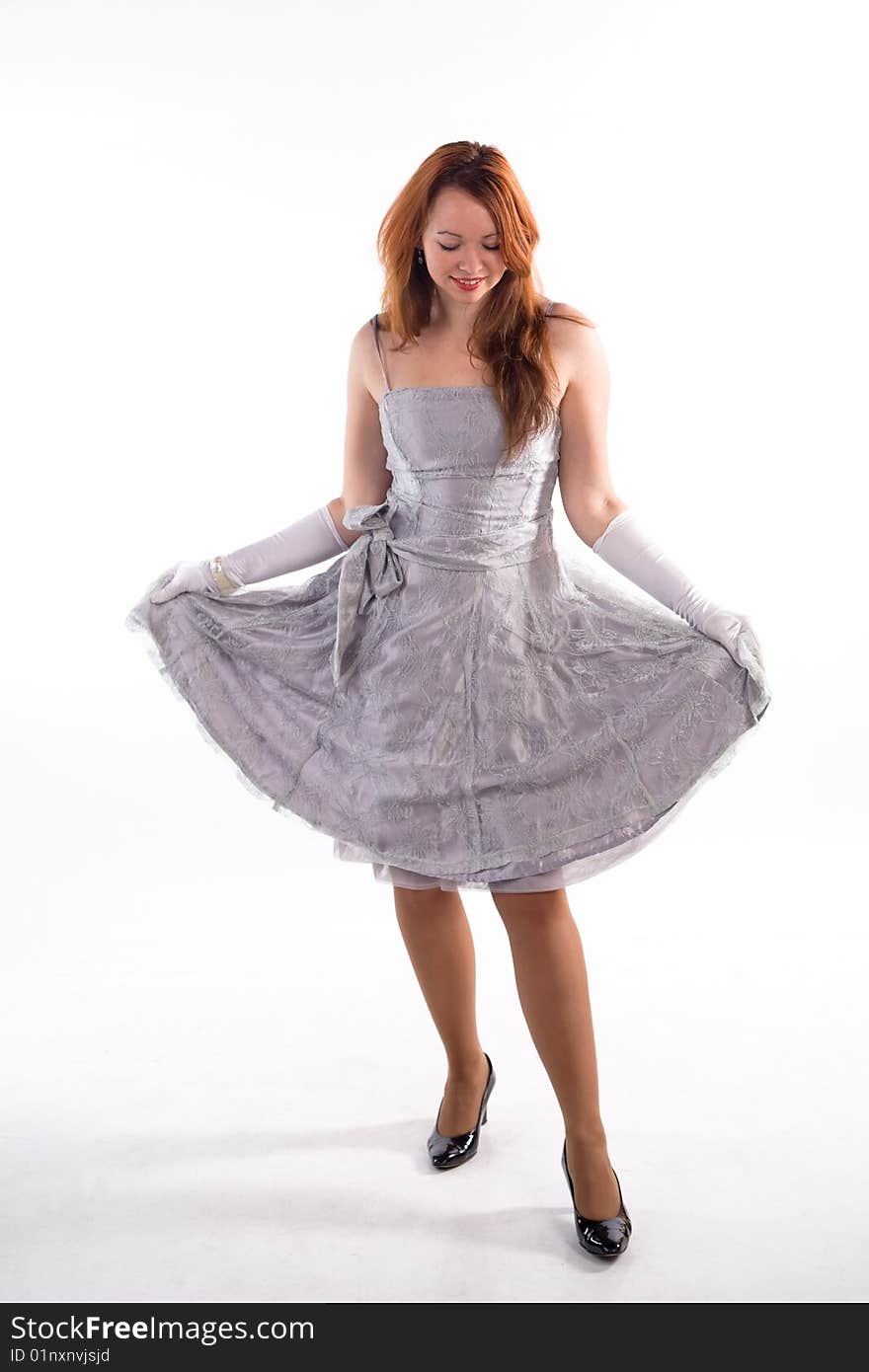 Young girl with white gloves standing on white background. Young girl with white gloves standing on white background