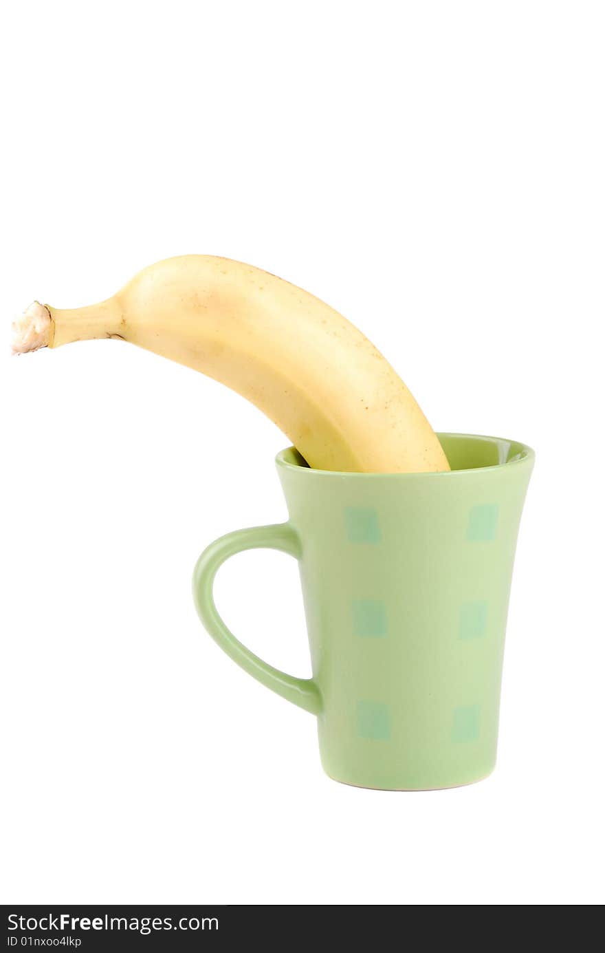 Yellow banana in a cup