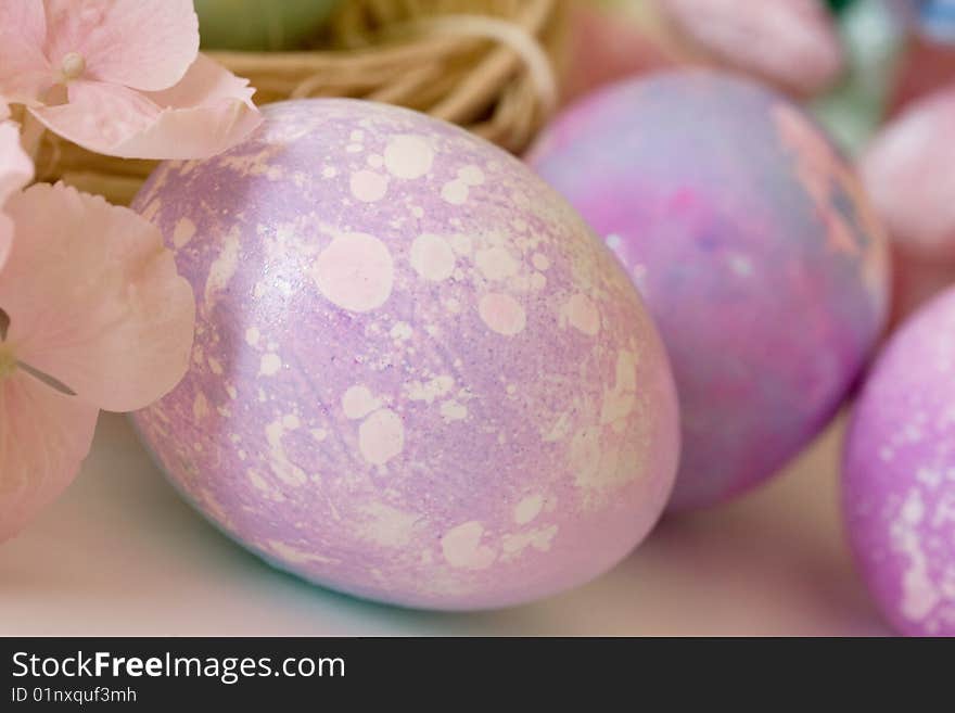 Composition of colorful eggs on the table