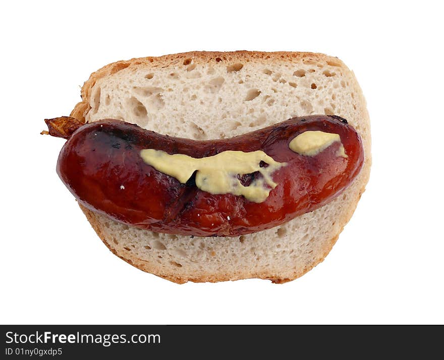 Grilled sausage with mustard on bread - isolated