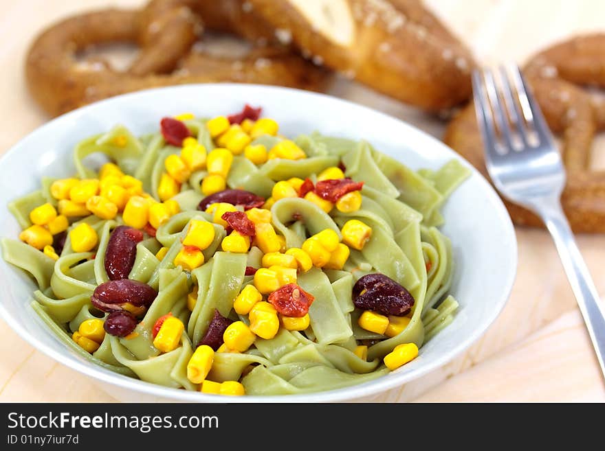 Green Pasta Salad With Corn And Kidney Beans.