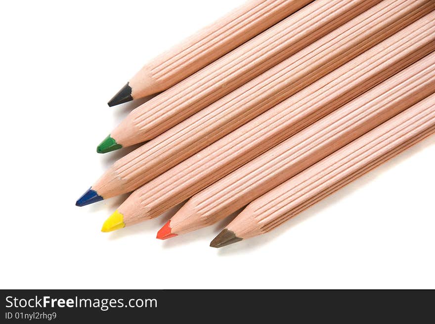 Six wooden pencils isplated over white. Six wooden pencils isplated over white