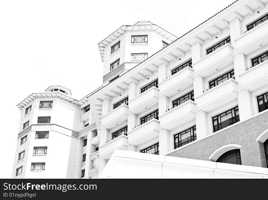 Modern white building on a white background. Modern white building on a white background