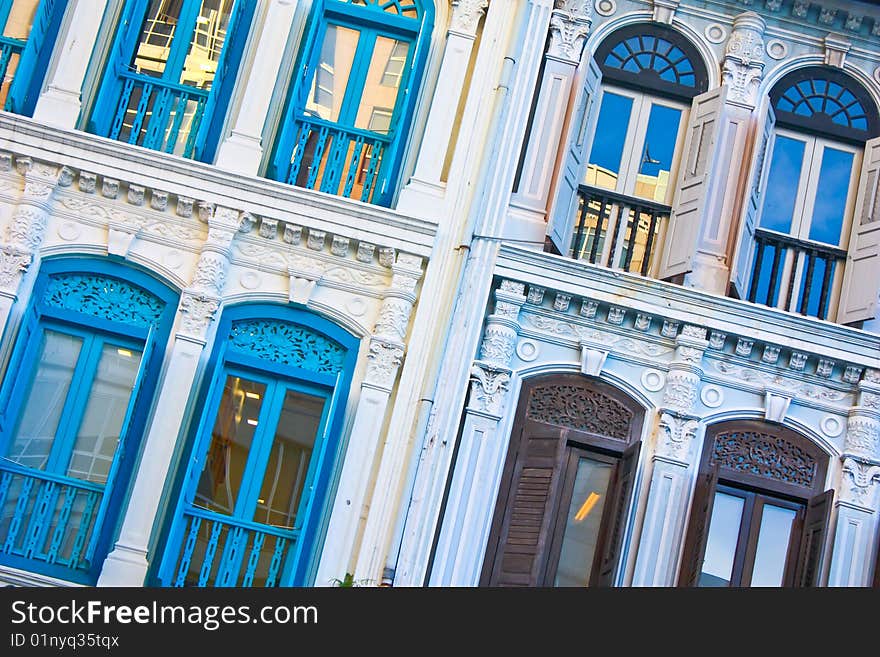 Old wooden windows in blue and brown colour. Old wooden windows in blue and brown colour