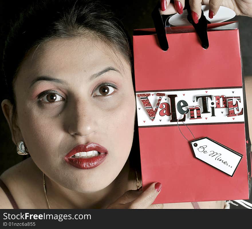 Girl holding valentine bag