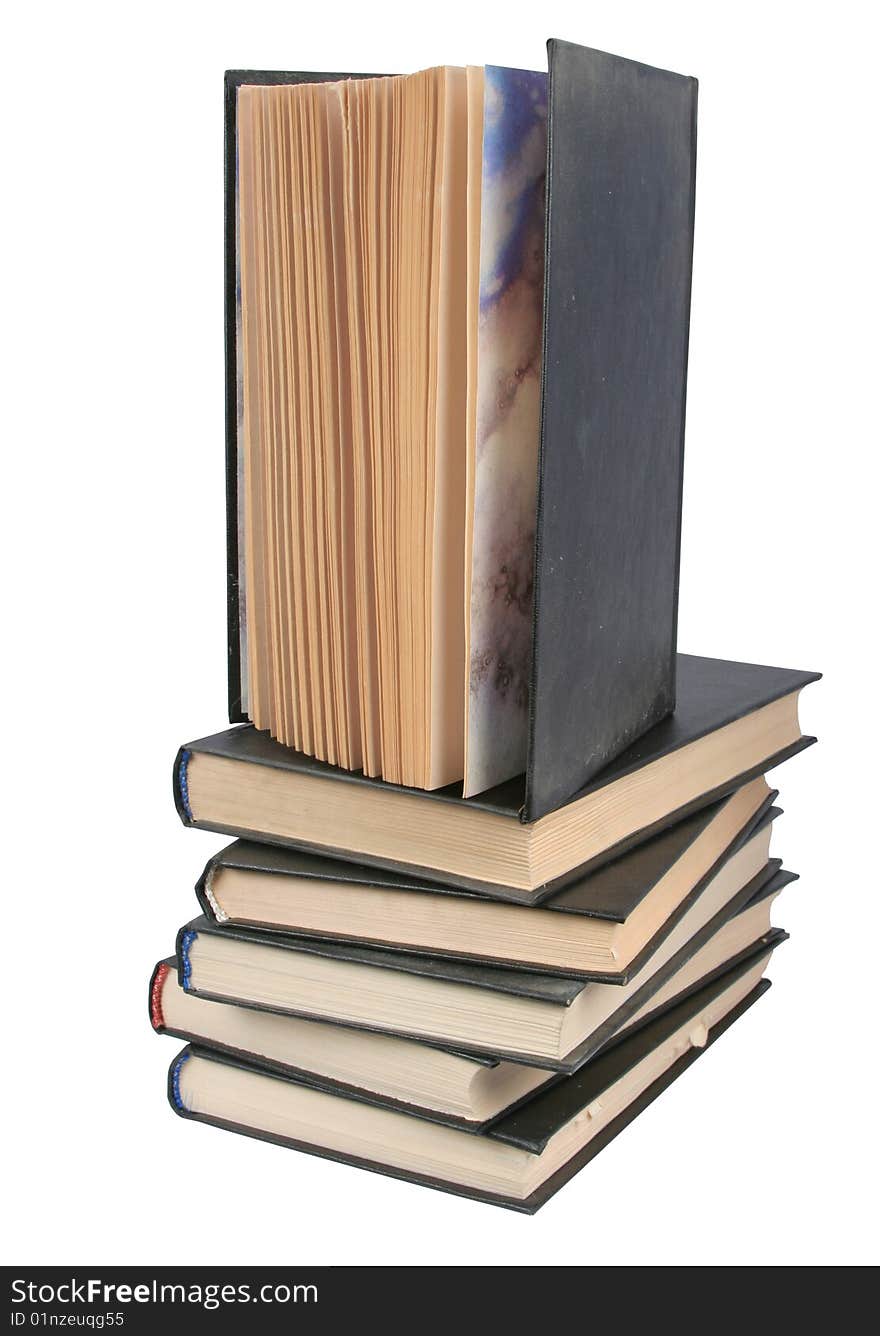 Pile of books and the open book on a white background