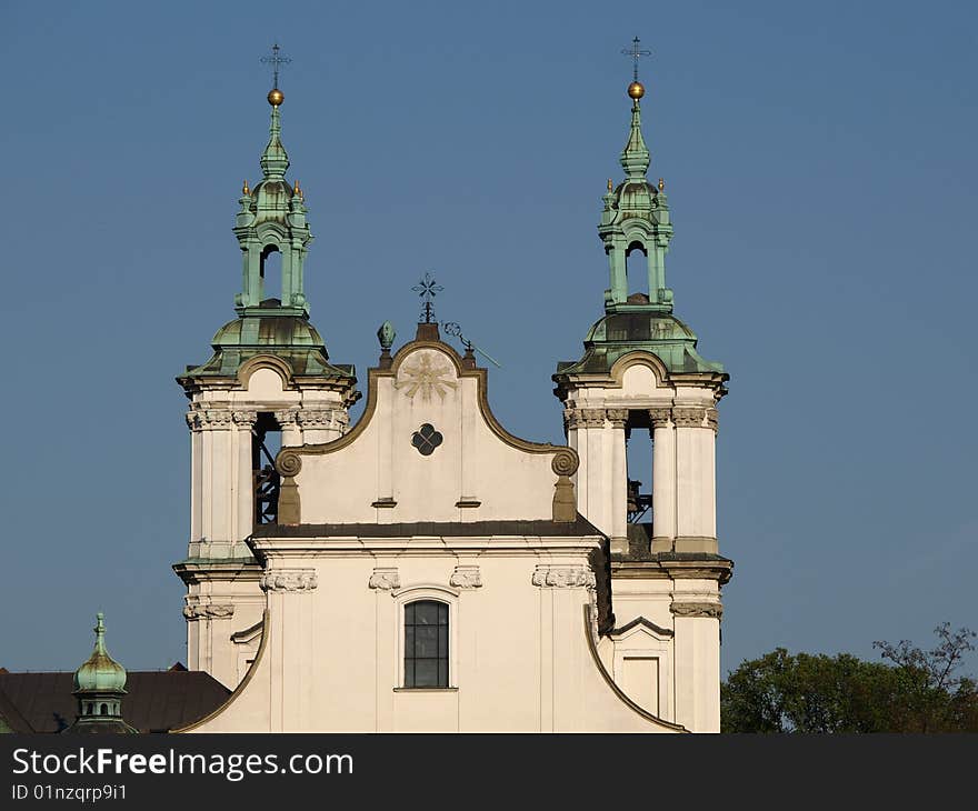 Skałka, which means a small rock in Polish, is a small hillock in Kraków where the Bishop of Krakow saint Stanislaus of Szczepanów was slain by order of Polish king Bolesław II the Bold in 1079. This action resulted in the king's exile and the eventual canonization of the slain bishop. The crypt underneath the church serves as a national Panthéon, a burial place for some of the most distinguished Poles, particularly those who lived in Kraków. Skałka, which means a small rock in Polish, is a small hillock in Kraków where the Bishop of Krakow saint Stanislaus of Szczepanów was slain by order of Polish king Bolesław II the Bold in 1079. This action resulted in the king's exile and the eventual canonization of the slain bishop. The crypt underneath the church serves as a national Panthéon, a burial place for some of the most distinguished Poles, particularly those who lived in Kraków.