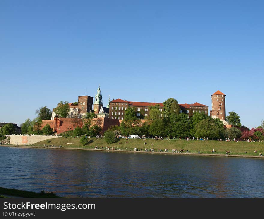 Wawel is an outcrop on the left bank of the Vistula River in Kraków, Poland.  This is a place of great significance for the Polish people. The Royal Castle with an armoury and the Cathedral are situated on the hill. Polish Royalty and many distinguished Poles are interred in the Wawel Cathedral. Royal coronations took place there also. Wawel is an outcrop on the left bank of the Vistula River in Kraków, Poland.  This is a place of great significance for the Polish people. The Royal Castle with an armoury and the Cathedral are situated on the hill. Polish Royalty and many distinguished Poles are interred in the Wawel Cathedral. Royal coronations took place there also.