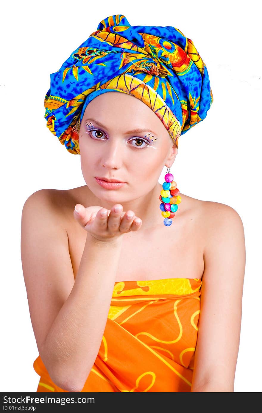 Beautiful girl with in colorful clothes and hat