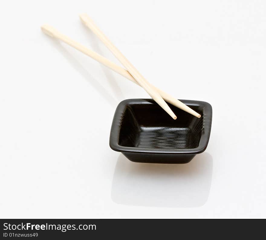 Chopsticks and a wasabi dish