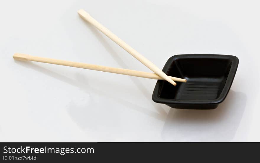 Chopsticks and a wasabi dish