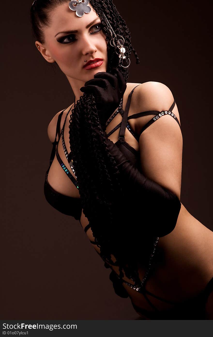 Beautiful girl body wearing fascinating black lingerie and gloves