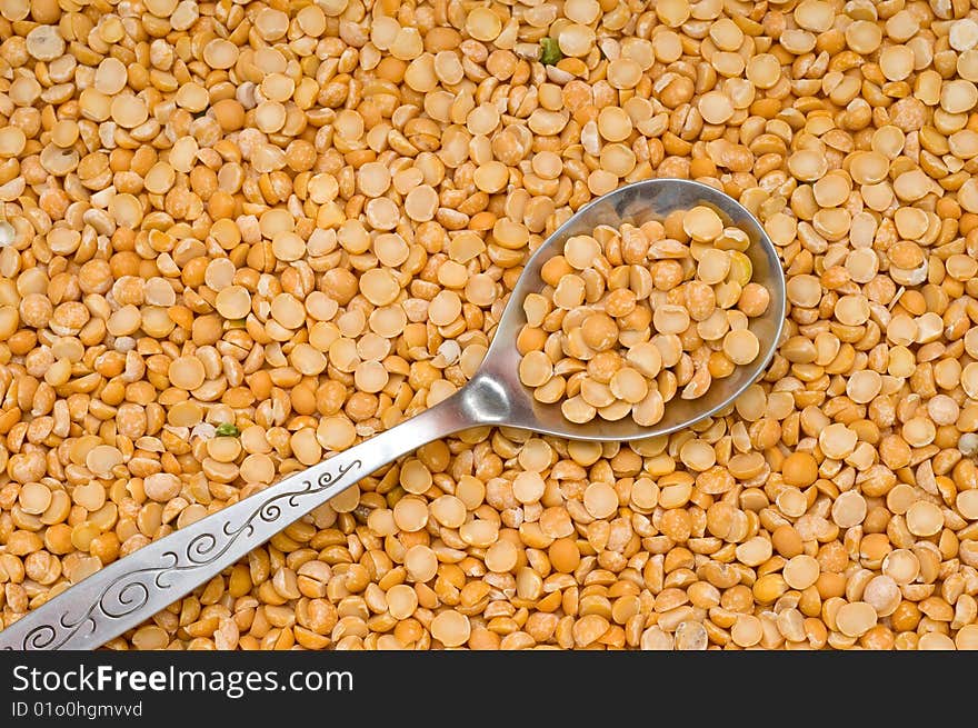 Dried-up  split peas background, close-up, cooking ingredients