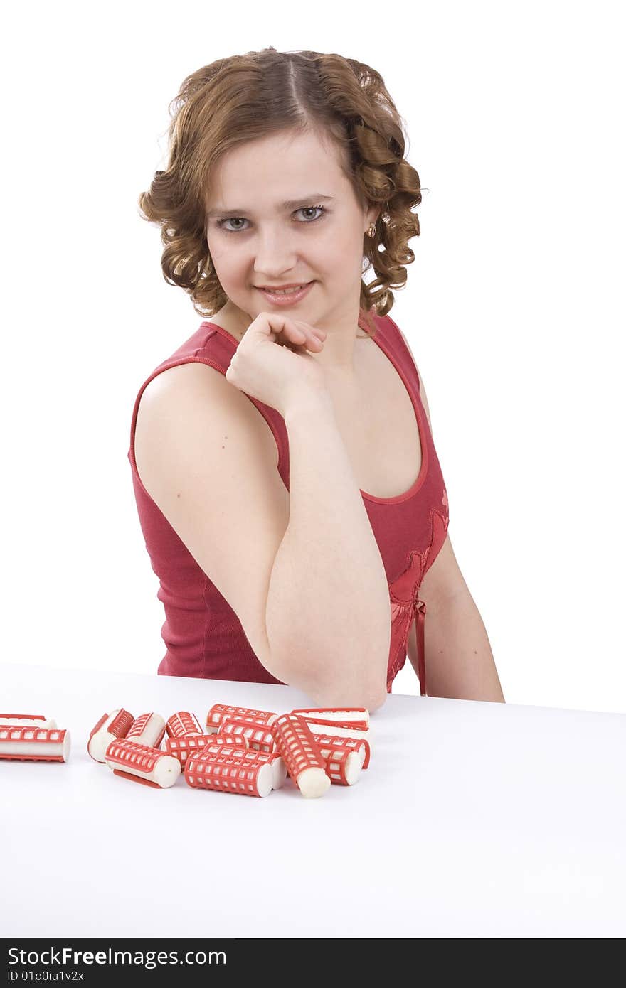 Woman with curlers. Young attractive housewife with hair rollers.  Isolated on white in studio. Woman with curlers. Young attractive housewife with hair rollers.  Isolated on white in studio.