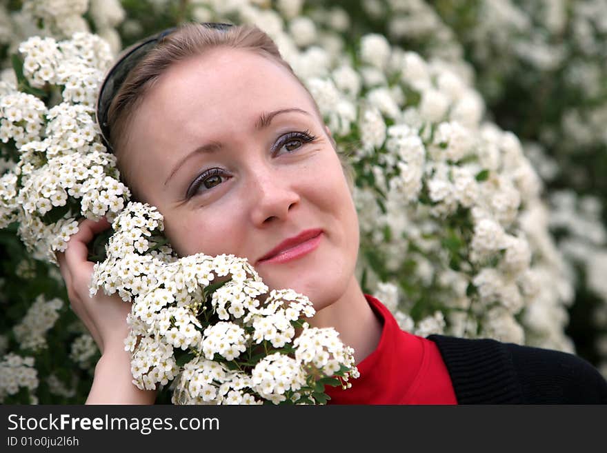 Young woman with white flowers. Young woman with white flowers