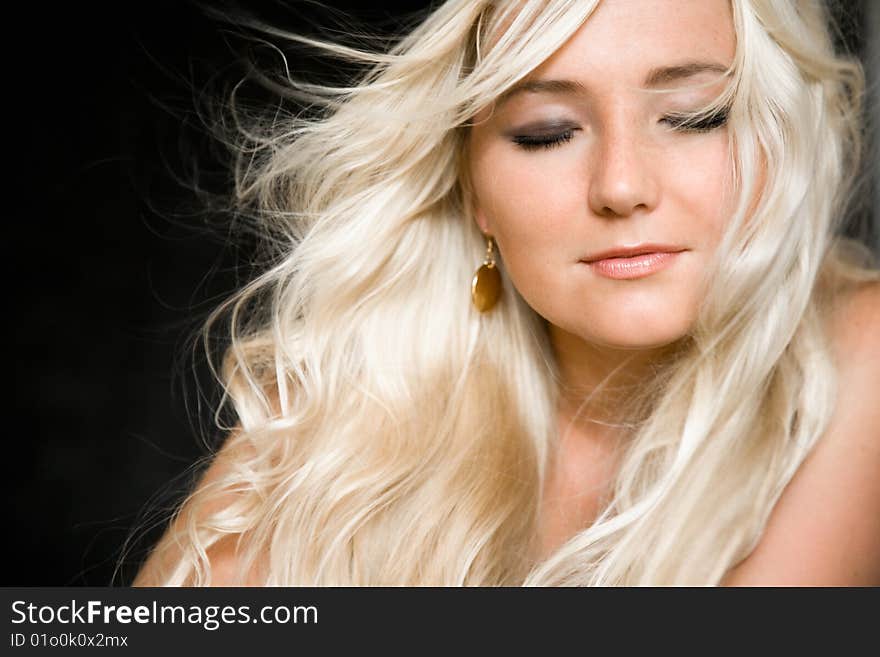 Close-up portrait of a fresh and beautiful young girl with closed eyes. Close-up portrait of a fresh and beautiful young girl with closed eyes