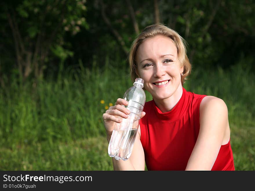 Woman With The Bottle