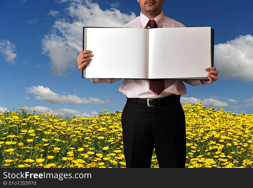 Man Showing A Book With Blank Pages