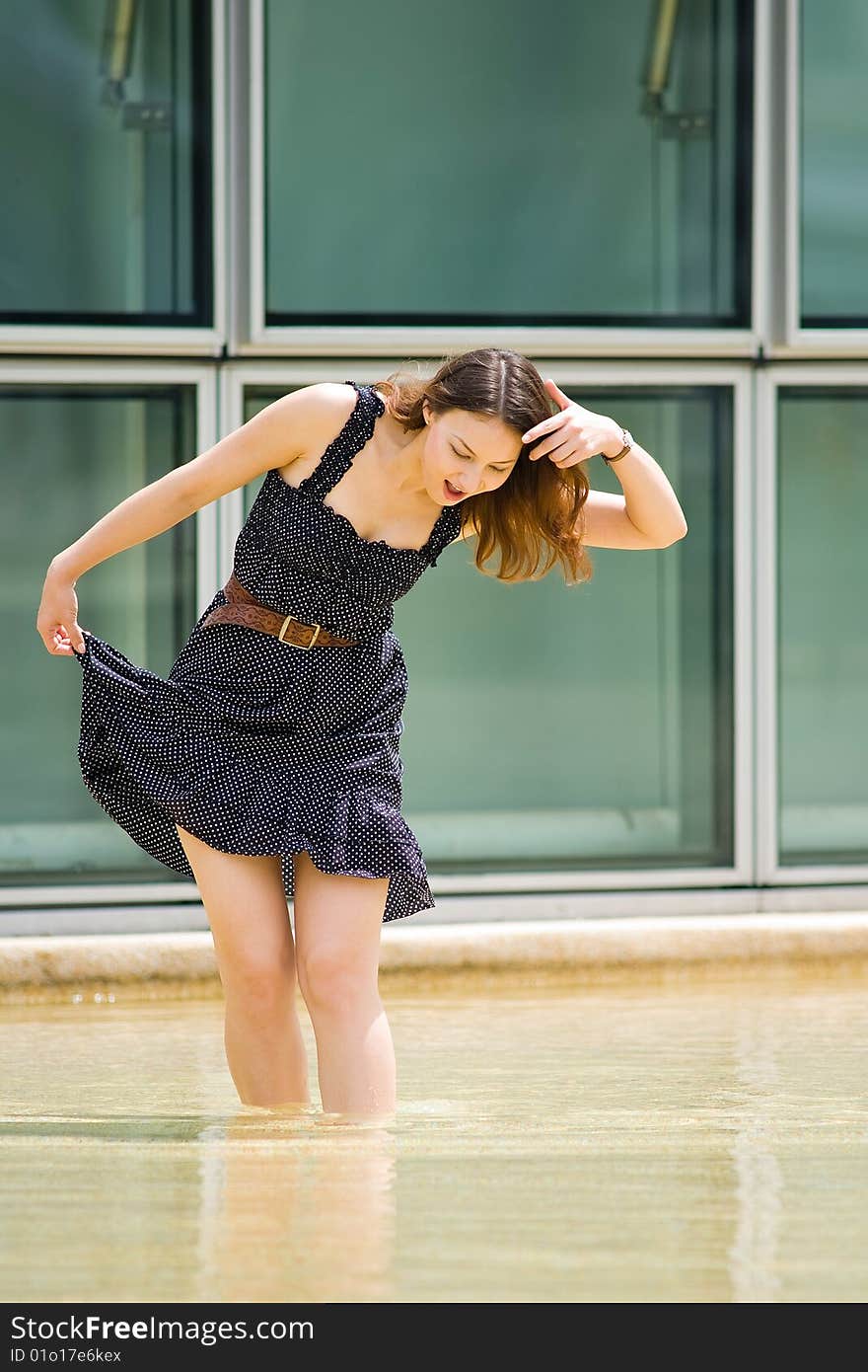 A young pretty caucasian lady having fun outdoors. A young pretty caucasian lady having fun outdoors