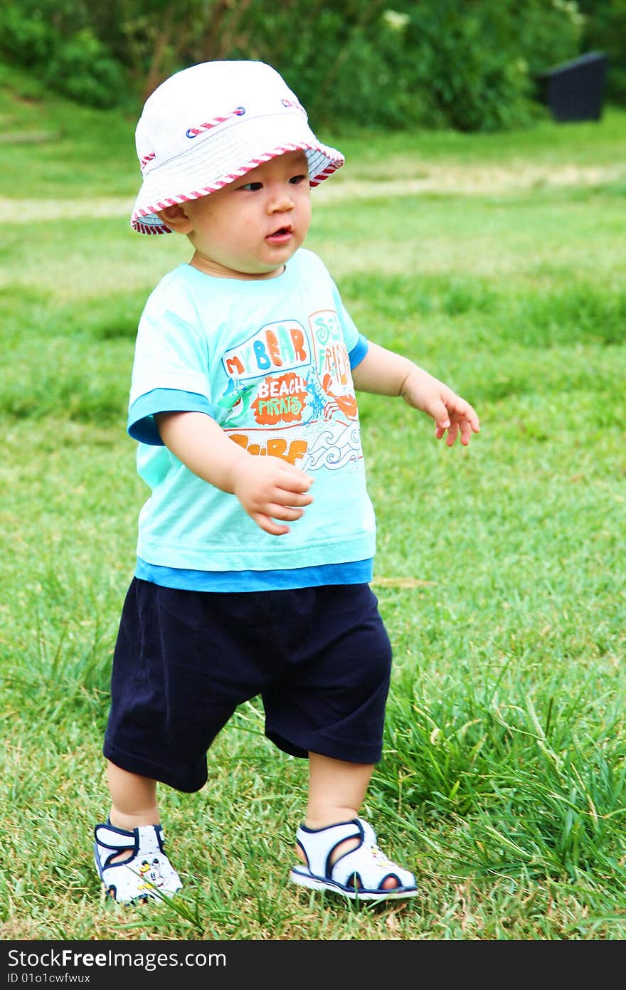 Cute kid running in the field