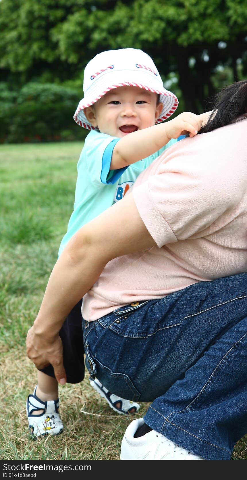 Cute kid want to be carry on the back