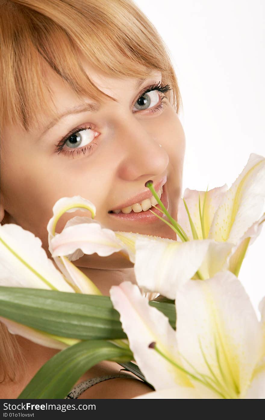 Close up glamor girl posing isolated on white with flowers. Close up glamor girl posing isolated on white with flowers