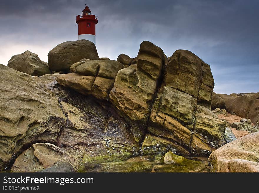 Umhlanga Lighthouse on the rocky coast of South Africa. Umhlanga Lighthouse on the rocky coast of South Africa